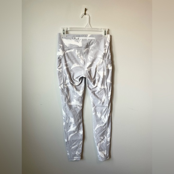 Lululemon Swift Speed Leggings with side pockets and back zipper pocket - Picture 2 of 4